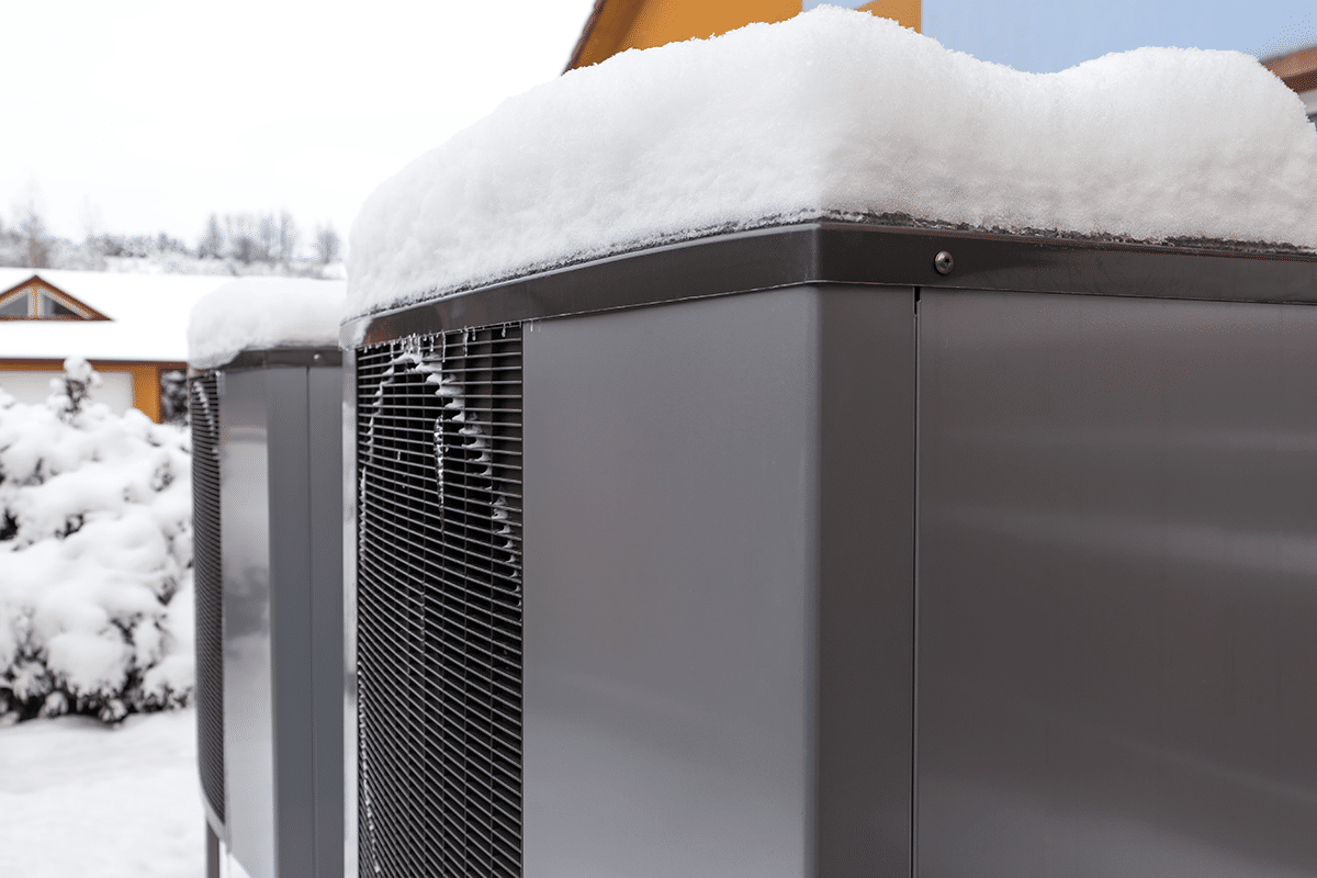 removing snow from an external heat pump