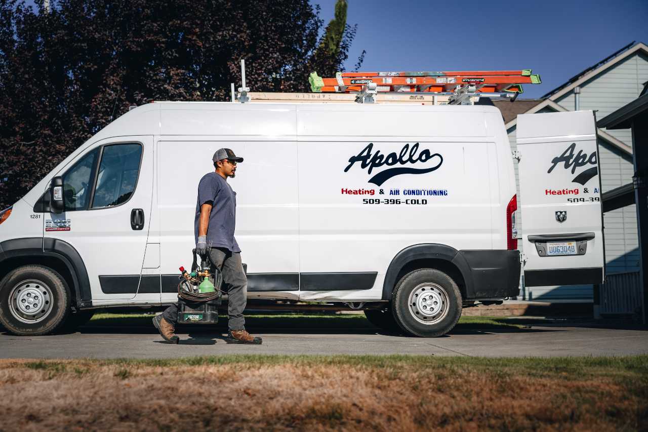 Apollo Heating & Air professional and our service van