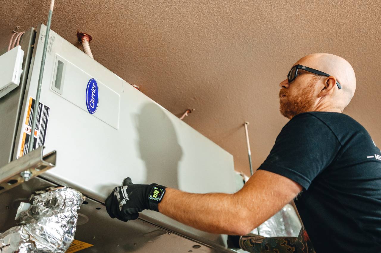 a reliable heating system being inspected by Apollo Heating & Air